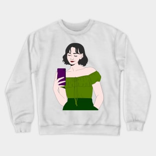 Beautiful girl using her phone Crewneck Sweatshirt